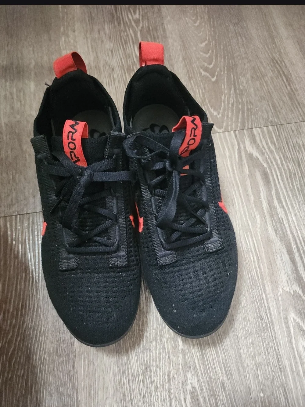 Nike Kids Black Sneakers with Red Accents